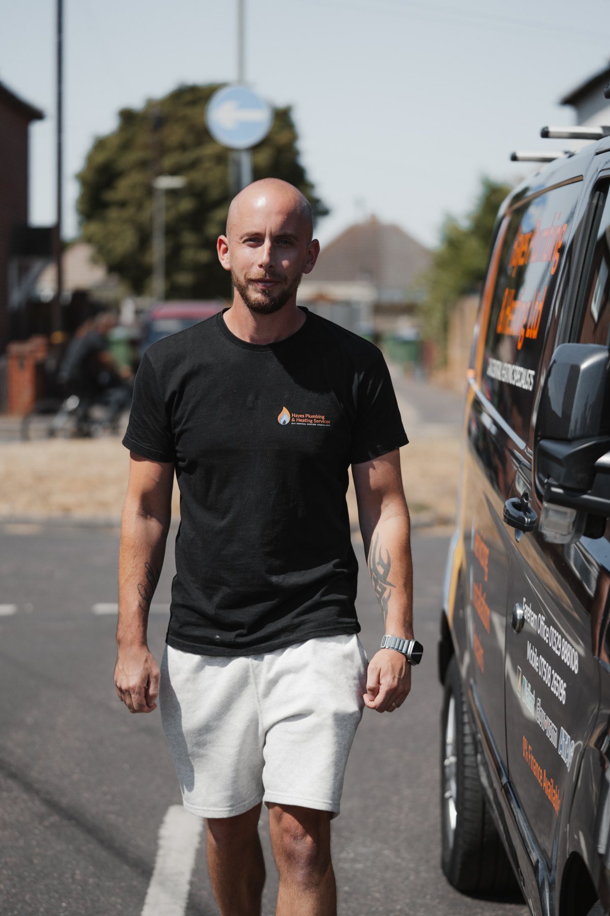 Ben Proctor of Hayes Plumbing and Heating with the company van